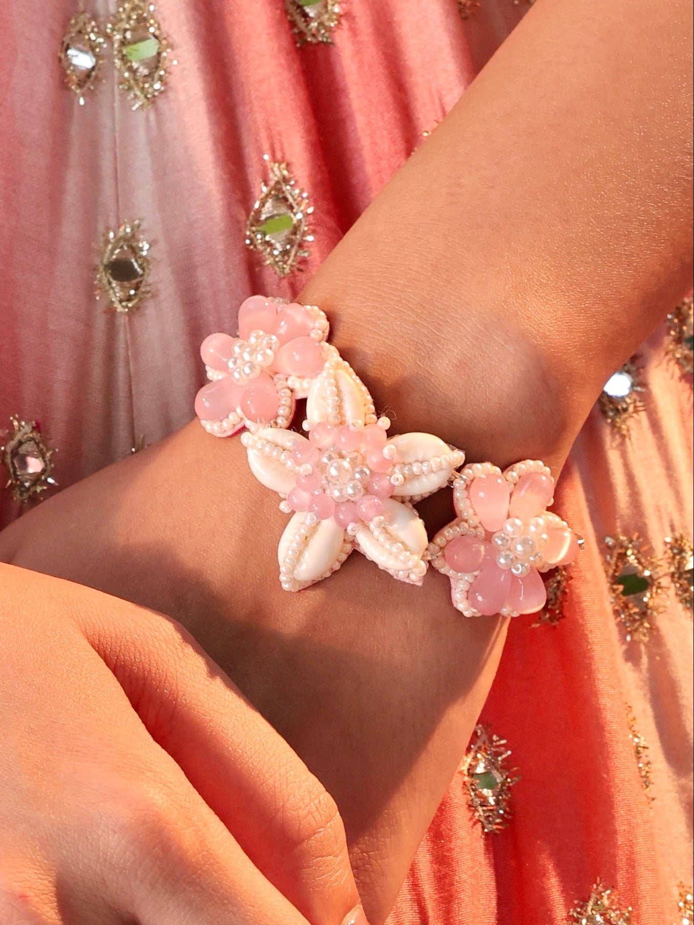 Rose Cowrie Pair of Bracelet